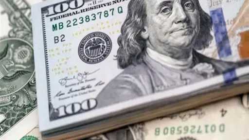 US Dollar Holds Steady Against...