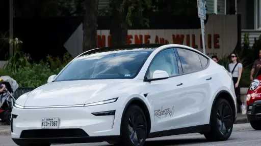 Musk says Tesla launching driverless...