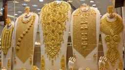 Gold Prices Hold Steady in...