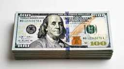US Dollar Holds Steady Against...